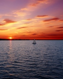 Ship In Sea At Sunset screenshot #1 128x160