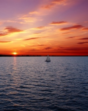 Ship In Sea At Sunset wallpaper 176x220