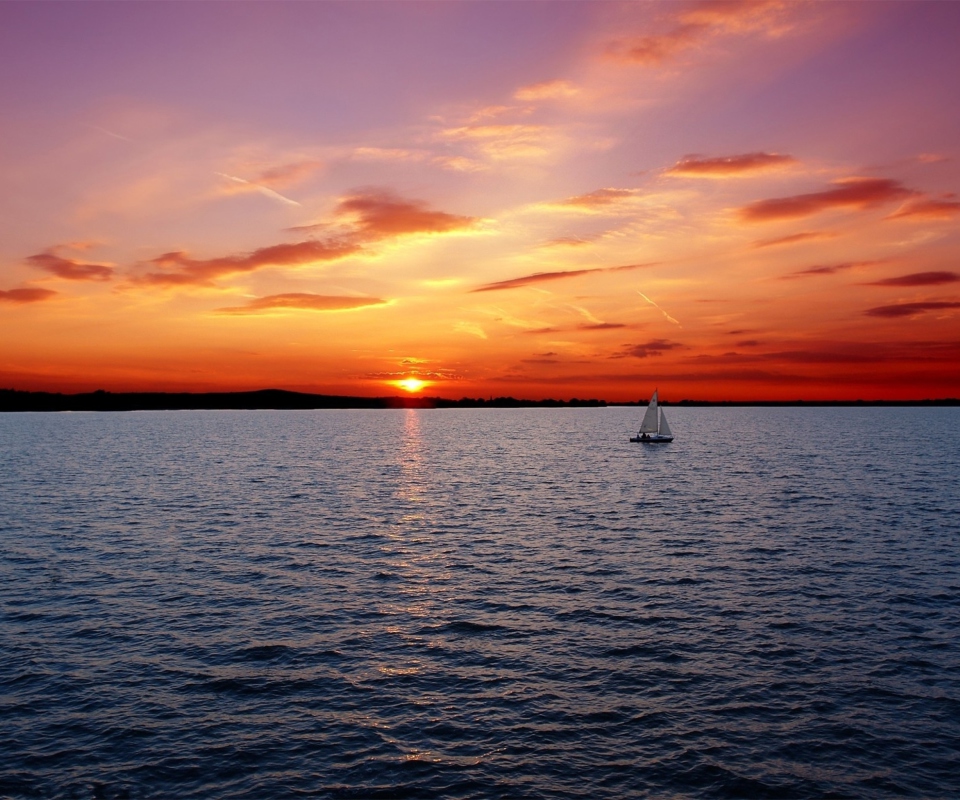 Обои Ship In Sea At Sunset 960x800