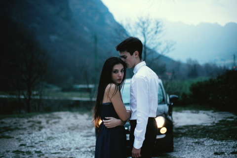 Couple In Front Of Car wallpaper 480x320