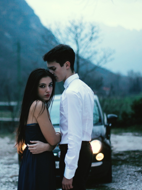 Обои Couple In Front Of Car 480x640