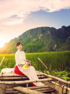 Fondo de pantalla Beautiful Asian Girl With Flowers Bouquet Sitting In Boat 240x320