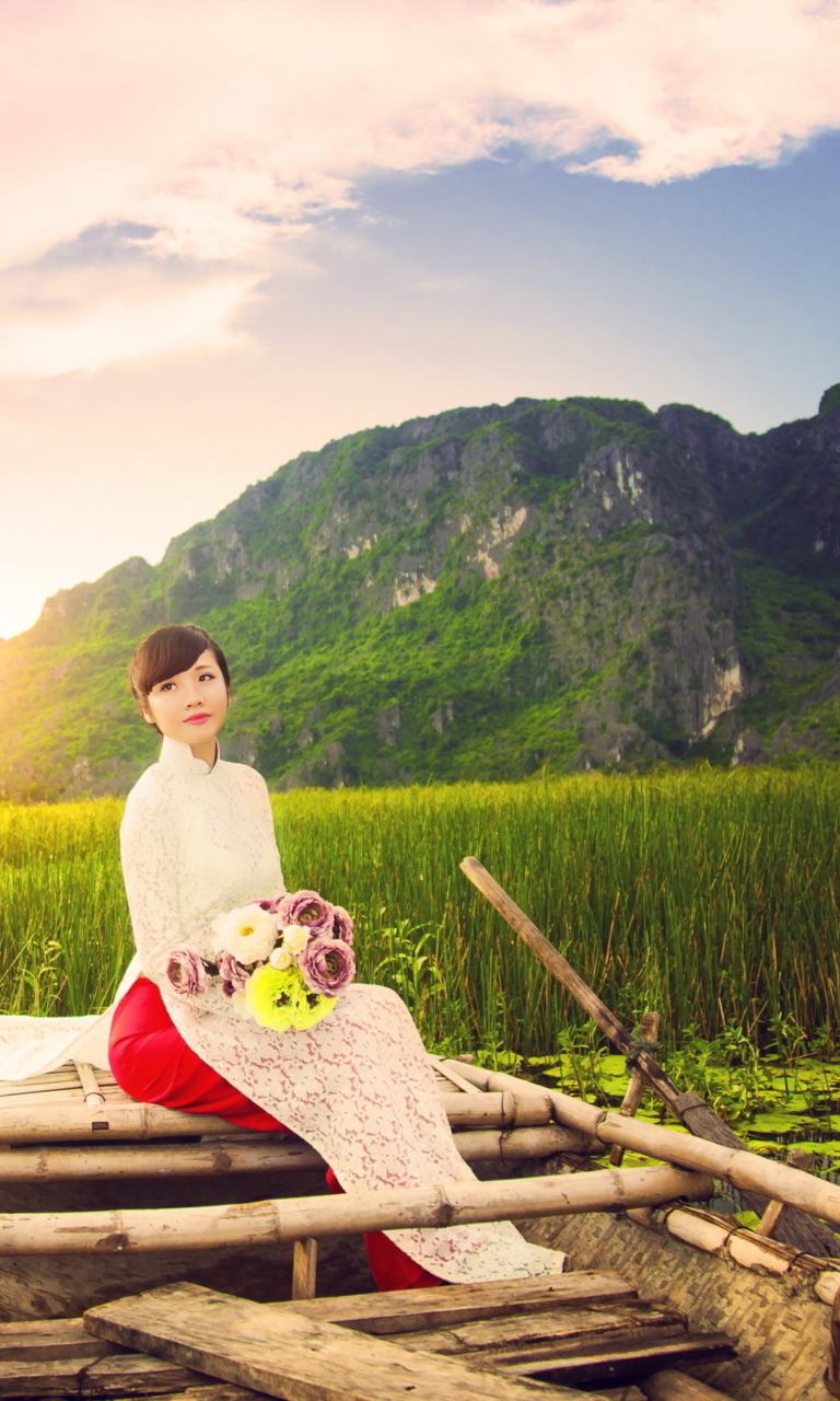 Fondo de pantalla Beautiful Asian Girl With Flowers Bouquet Sitting In Boat 768x1280