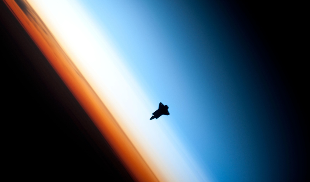 Das Shuttle In Outer Space Wallpaper 1024x600