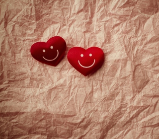Kostenloses Smiling Hearts Wallpaper für iPad mini