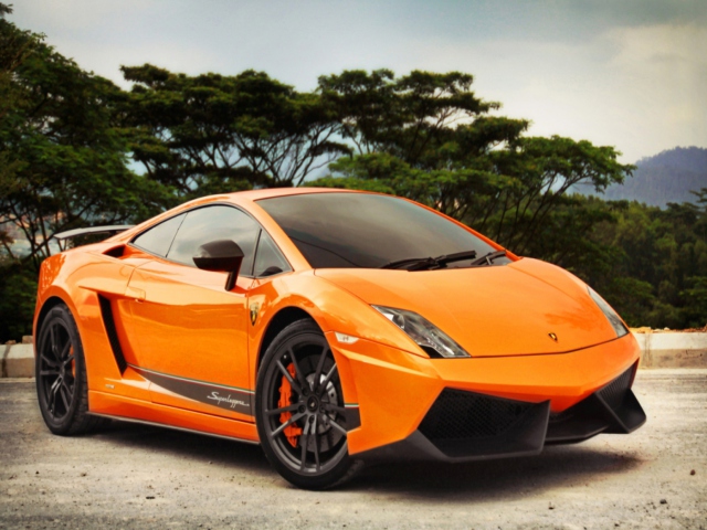 Orange Lamborghini wallpaper 640x480