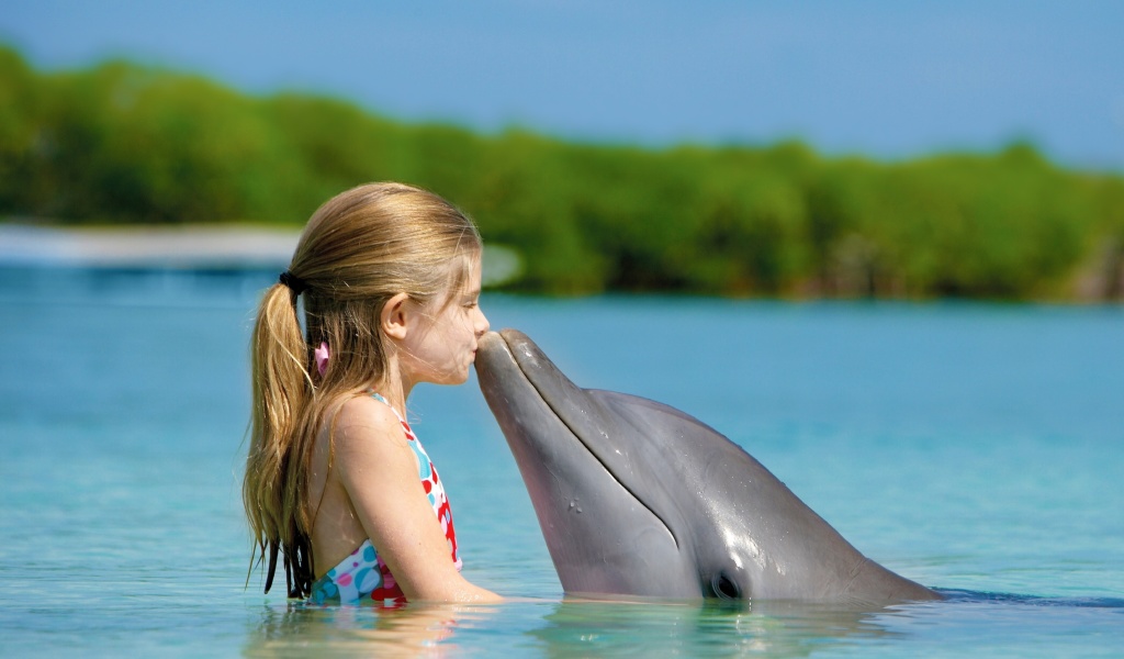 Girl and dolphin kiss wallpaper 1024x600
