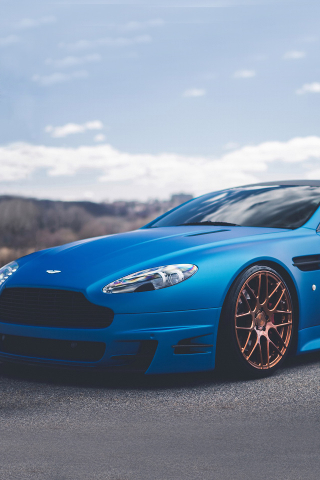 Blue Aston Martin V8 Vantage S wallpaper 640x960