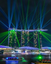 Обои Laser show near Marina Bay Sands Hotel in Singapore 176x220