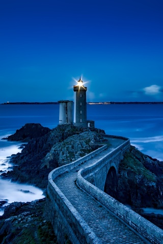 France Lighthouse in Ocean wallpaper 320x480