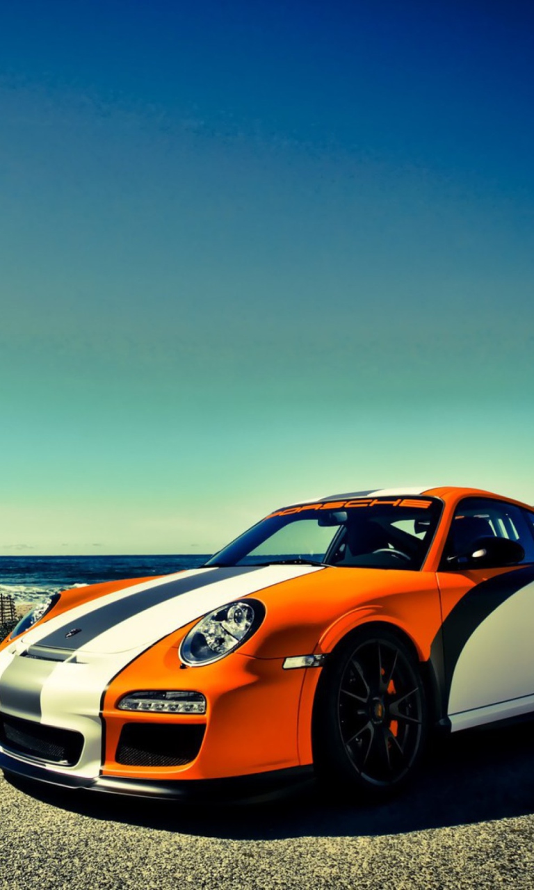 Обои Orange Porsche 997 768x1280