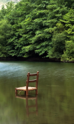 Chair In Middle Of Pieceful Lake wallpaper 240x400