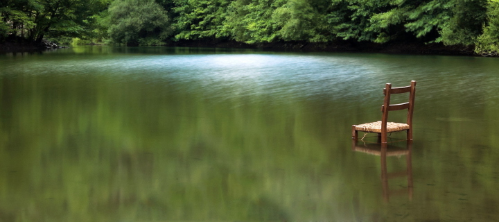 Chair In Middle Of Pieceful Lake wallpaper 720x320