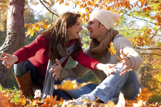 Happy Couple In Autumn Park Wallpaper for Android, iPhone and iPad