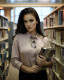 Обои Girl with books in library 128x160