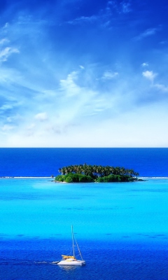 Fondo de pantalla Green Island In Middle Of Blue Ocean And White Boat 240x400