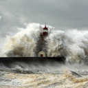 Fondo de pantalla Lighthouse At Storm 128x128