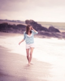 Обои Girl Walking On The Beach 128x160