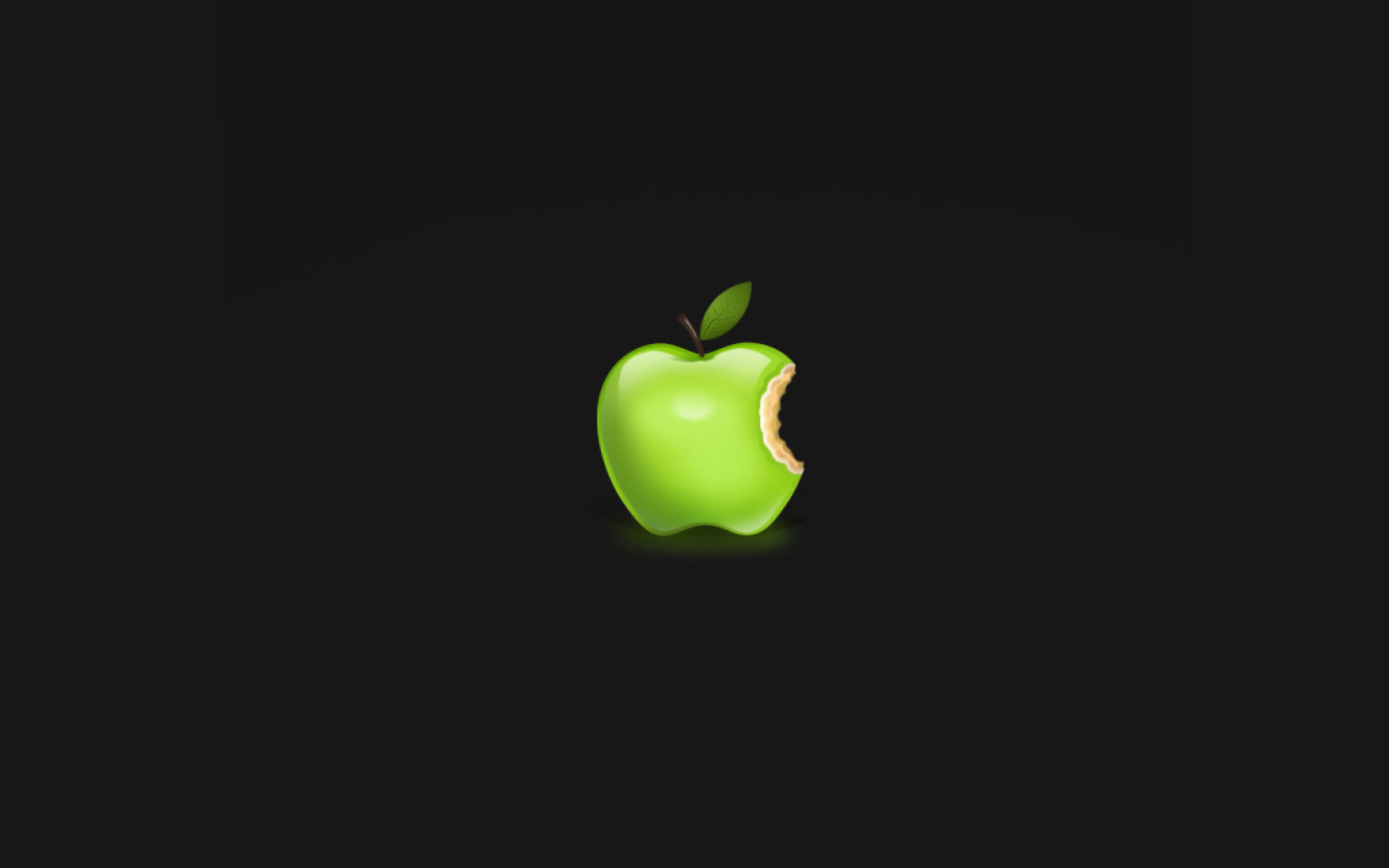 Зеленое яблоко на черном фоне
