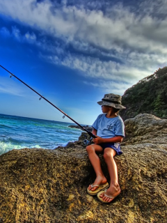 Das Young Boy Fishing Wallpaper 240x320
