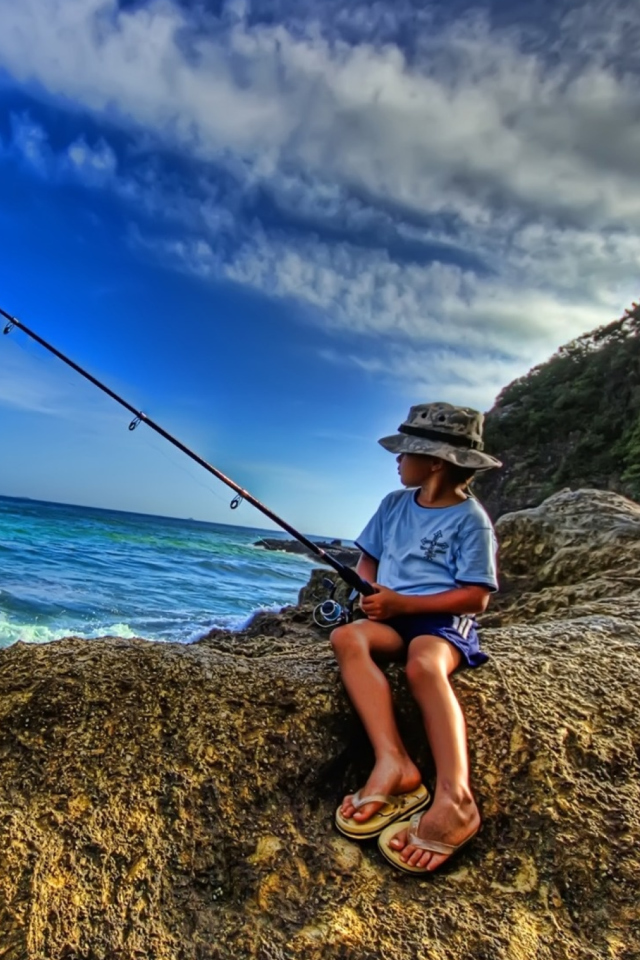 Обои Young Boy Fishing 640x960