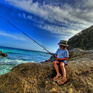 Young Boy Fishing - Obrázkek zdarma pro 1024x1024