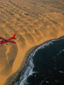 Sfondi Airplane Above Desert 132x176