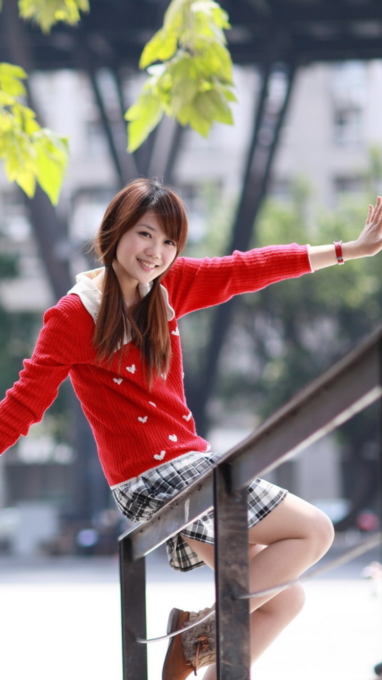 Pretty Asian Girl In Red Jumper wallpaper 750x1334