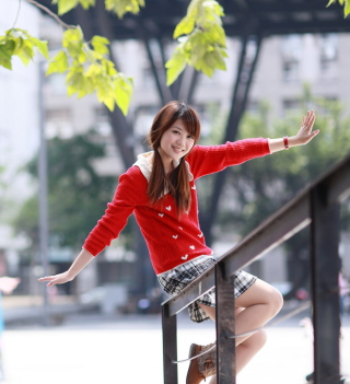 Kostenloses Pretty Asian Girl In Red Jumper Wallpaper für iPad