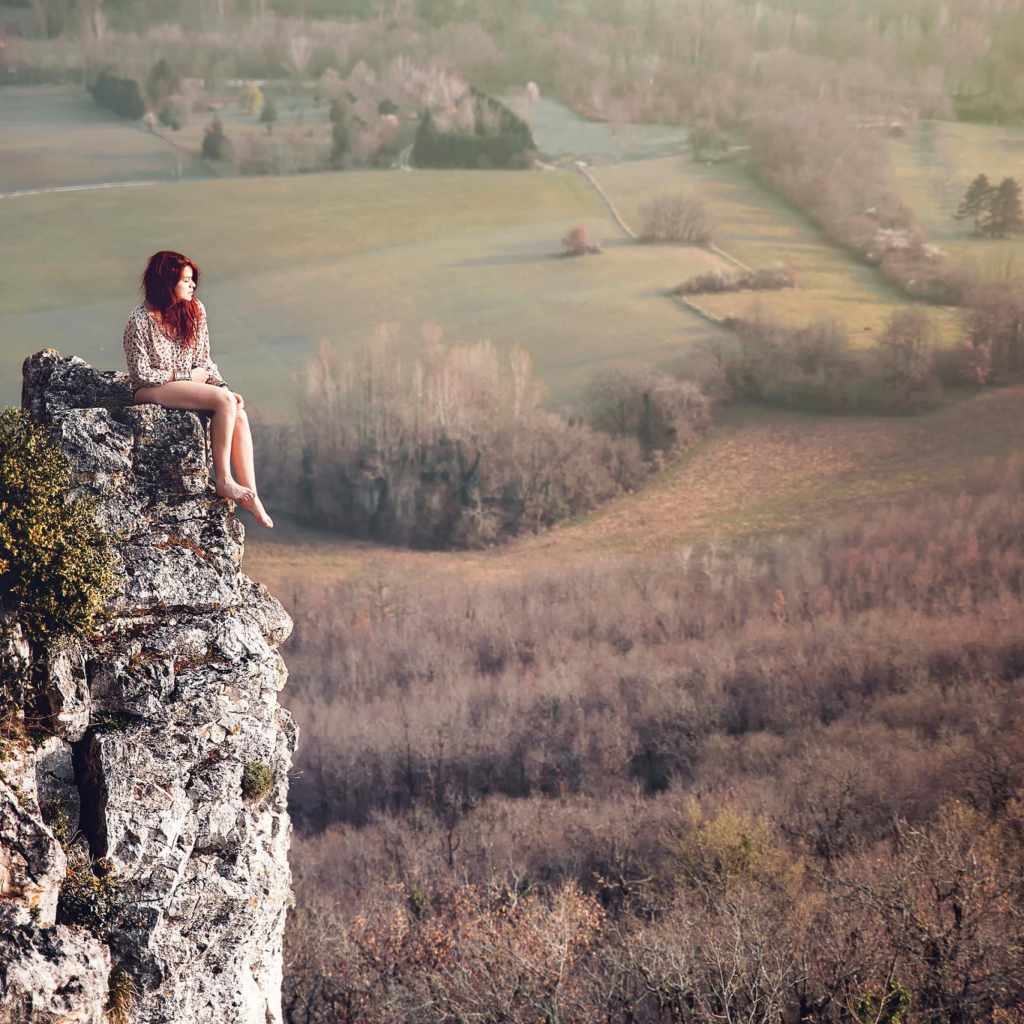 Redhead Girl Sitting On Rock wallpaper 1024x1024