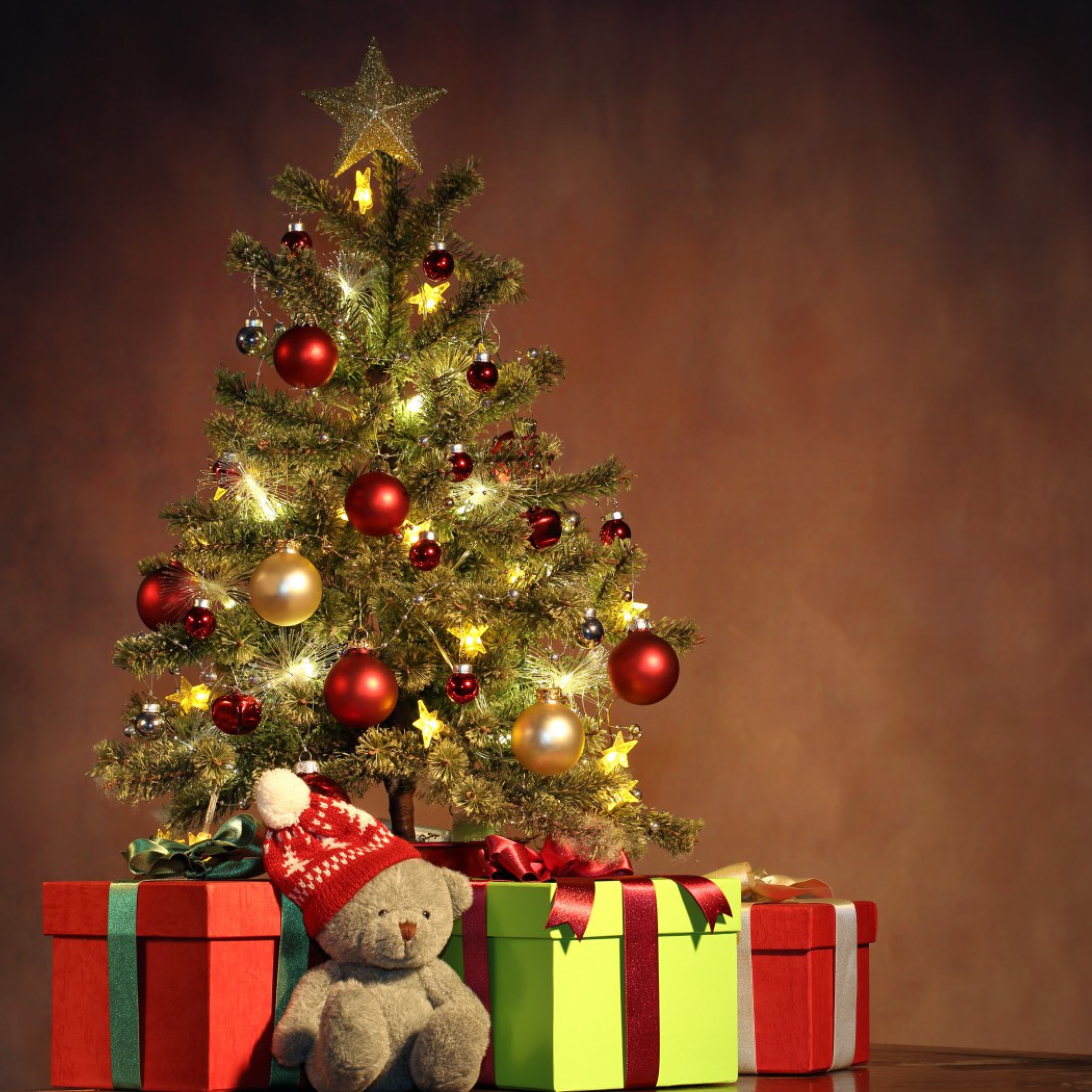 Christmas Presents Under Christmas Tree wallpaper 2048x2048