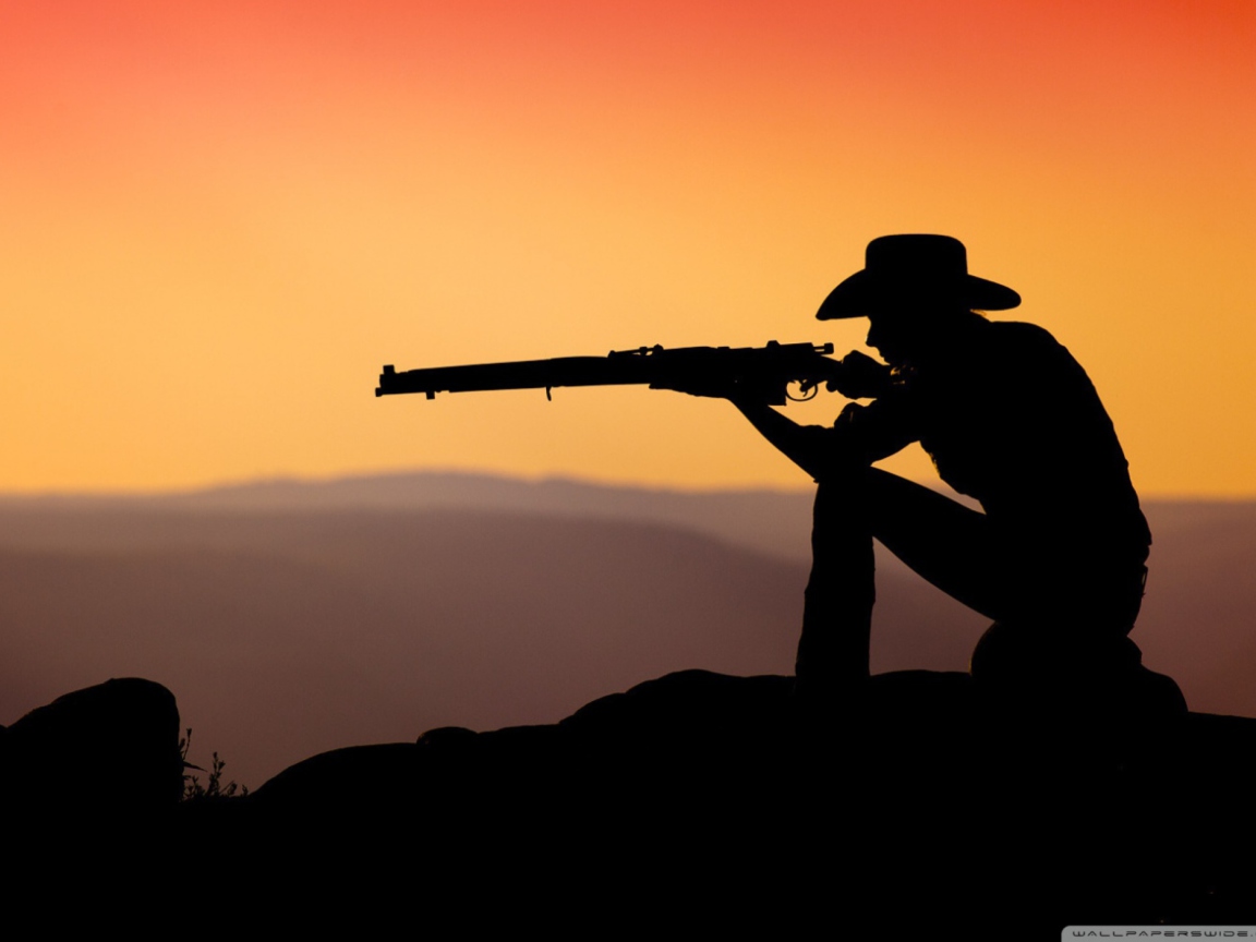 Обои Cowboy Shooting In The Sunset 1152x864