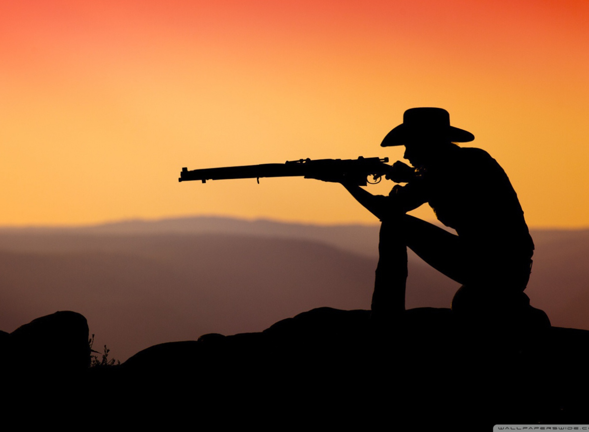 Cowboy Shooting In The Sunset wallpaper 1920x1408