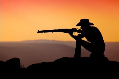 Cowboy Shooting In The Sunset wallpaper 480x320