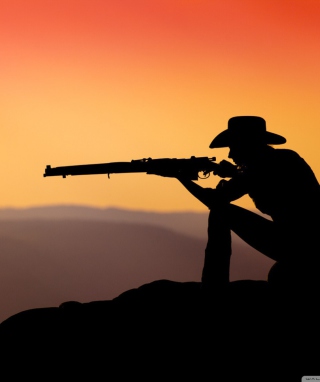 Cowboy Shooting In The Sunset papel de parede para celular para Blackberry RIM Torch 9860
