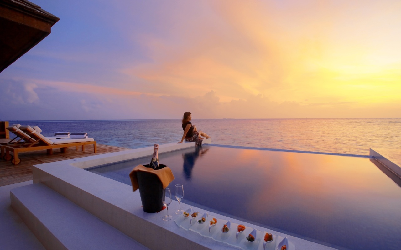 Maldives pool with girl wallpaper 1280x800