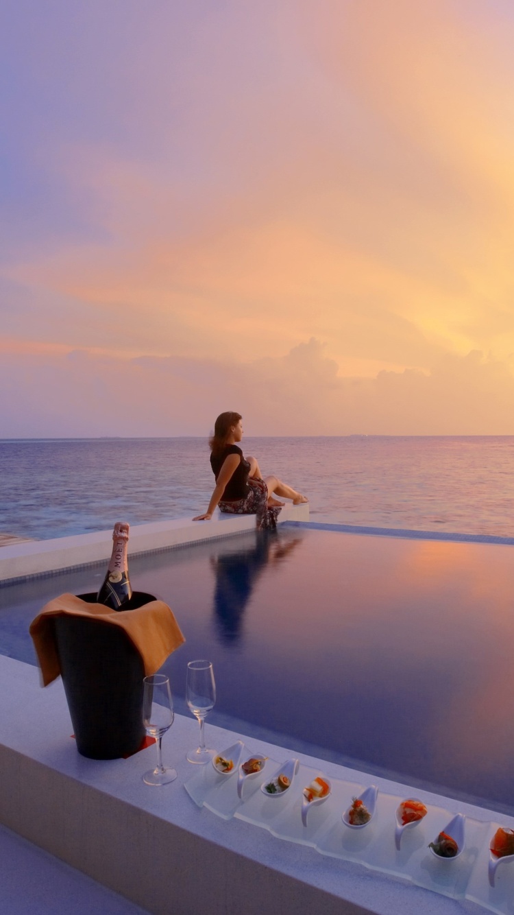 Maldives pool with girl wallpaper 750x1334