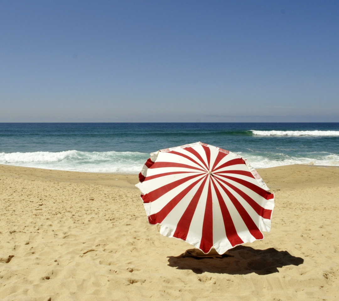 Das Umbrella On The Beach Wallpaper 1080x960