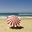 Das Umbrella On The Beach Wallpaper 128x128