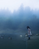 Das Child Feeding Ducks In Misty Morning Wallpaper 128x160