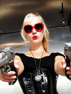 Обои Blonde girl with pistols 240x320