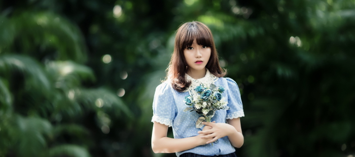 Cute Asian Model With Flower Bouquet wallpaper 720x320