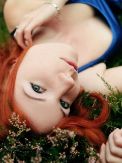 Redhead Girl Laying In Grass wallpaper 240x320
