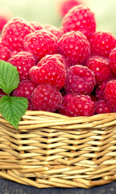 Basket with raspberries wallpaper 240x400
