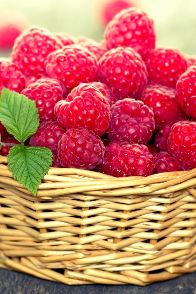 Basket with raspberries wallpaper 640x960