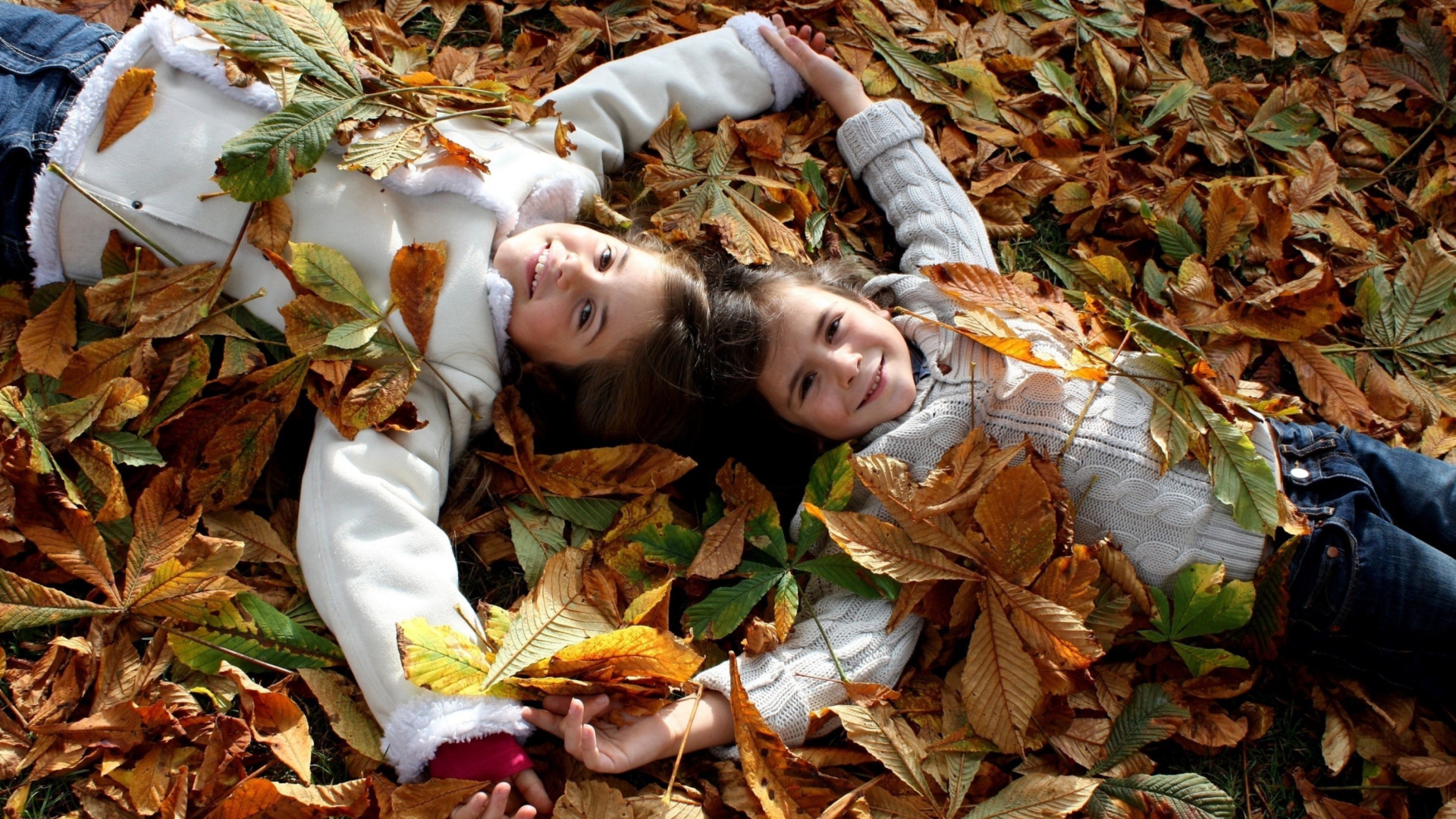 Sfondi Cute Child Girls On Autumn Leaves Carpet 1920x1080