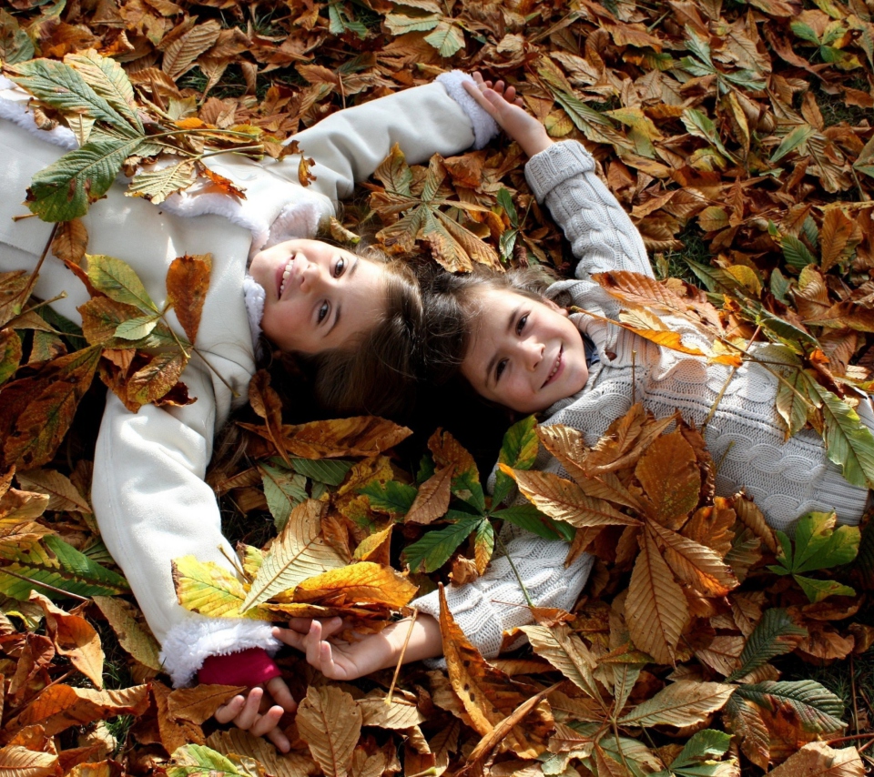 Cute Child Girls On Autumn Leaves Carpet wallpaper 960x854