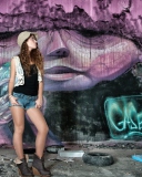 Sfondi Girl In Front Of Graffiti Wall 128x160