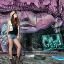 Girl In Front Of Graffiti Wall wallpaper 208x208