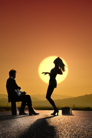 Das Silhouettes At Sunset Wallpaper 320x480